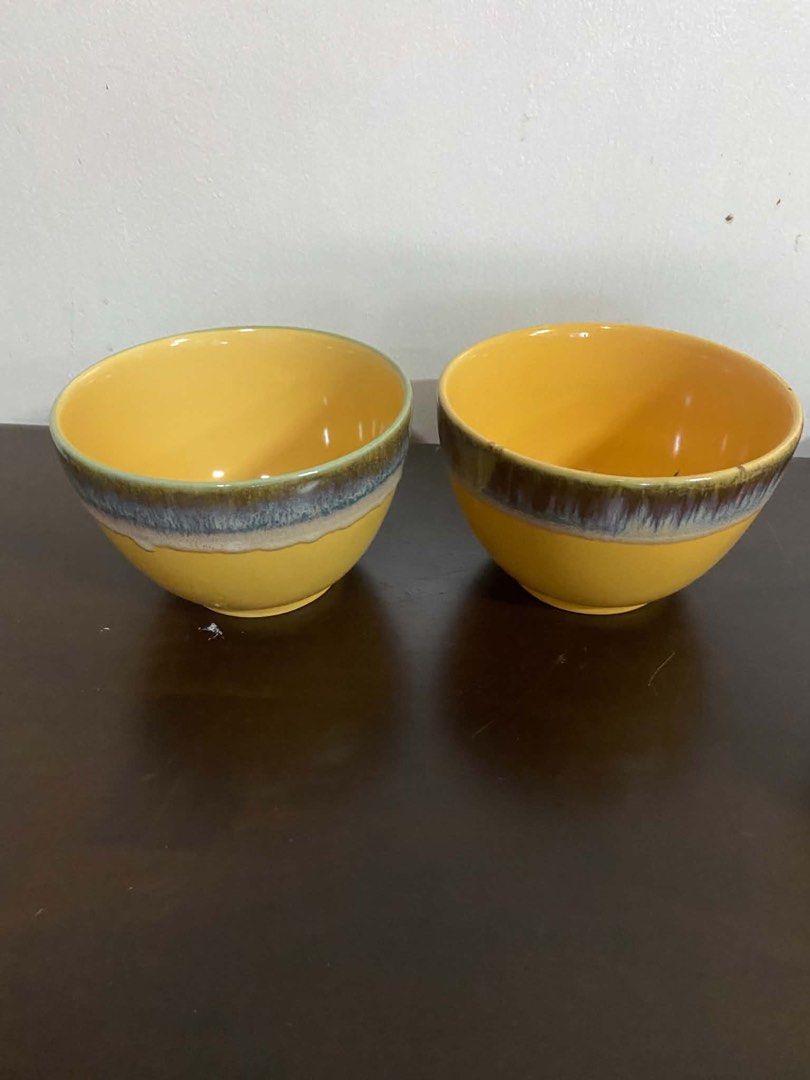Ceramic Plates Bowls Set Grape and Yellow Design (Category: Dinnerware & Cutlery) located in Quezon City. Submitted by nathaliedychiao (Listing ID 1467735895, Image 2). Description: - Matching ceramic dishware set for rustic table settings or daily meals - Includes 2 cream-centered plates with purple grapes and blue rims - Includes 2 yellow bowls featuring reactive brown-grey glazed rims - Includes 2 yellow bowls with charming ruffled edges - Sol