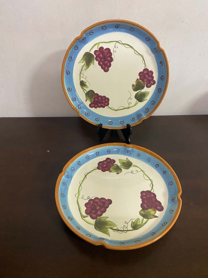 Ceramic Plates Bowls Set Grape and Yellow Design (Category: Dinnerware & Cutlery) located in Quezon City. Submitted by nathaliedychiao (Listing ID 1467735895, Image 1). Description: - Matching ceramic dishware set for rustic table settings or daily meals - Includes 2 cream-centered plates with purple grapes and blue rims - Includes 2 yellow bowls featuring reactive brown-grey glazed rims - Includes 2 yellow bowls with charming ruffled edges - Sol