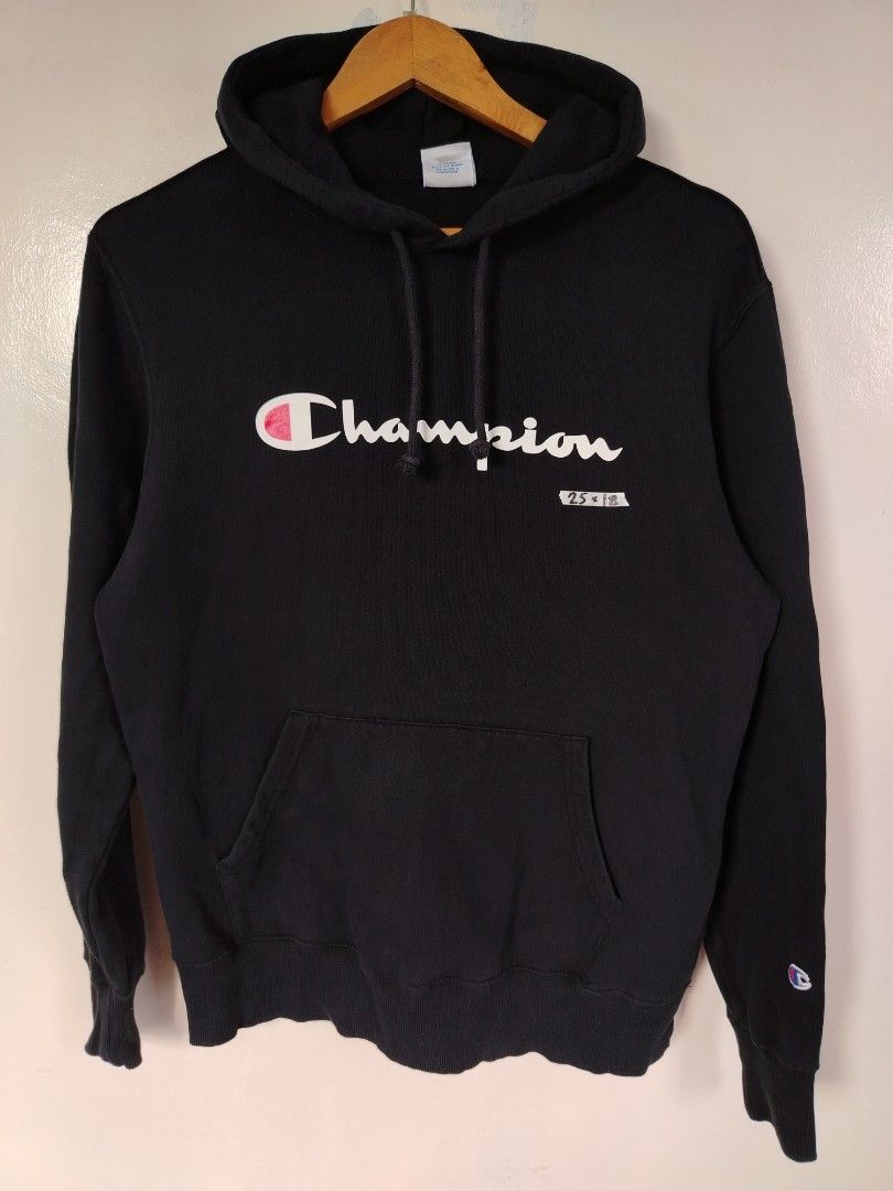 Champion Black Script Logo Hoodie Sweatshirt (Category: Hoodies) located in Manila. Submitted by zyclothing03 (Listing ID 1467689785, Image 1). Description: - Authentic black Champion pullover hoodie - Bold script logo across the chest - Warm fleece lining for extra comfort - Front kangaroo pocket and adjustable drawstring hood - Ribbed cuffs and iconic embroidered patch logo on left sleeve - Great for layering and everyday streetwear style.