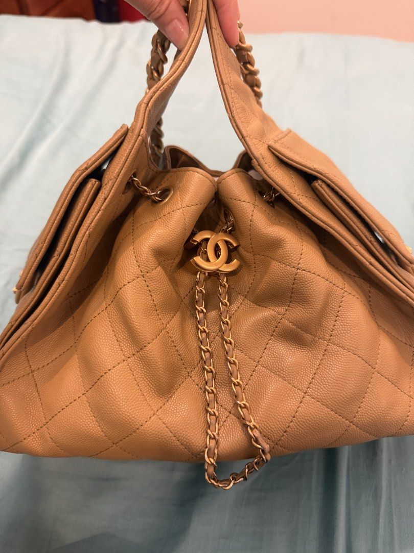 Chanel C25 Small (Category: Luxury Bags & Wallets) located in Malabon City. Submitted by csd0000 (Listing ID 1467838590, Image 1). Description: RFS: I now prefer the mini size 9.5/10 With box, dustbag. Beige. Gold hardware throughout with iconic interlocking CC logo clasp. Drawstring closure mechanism paired with chain-link shoulder straps. Multiple exterior flap pockets with snap fastenings. Structured base and premium grained leather texture..