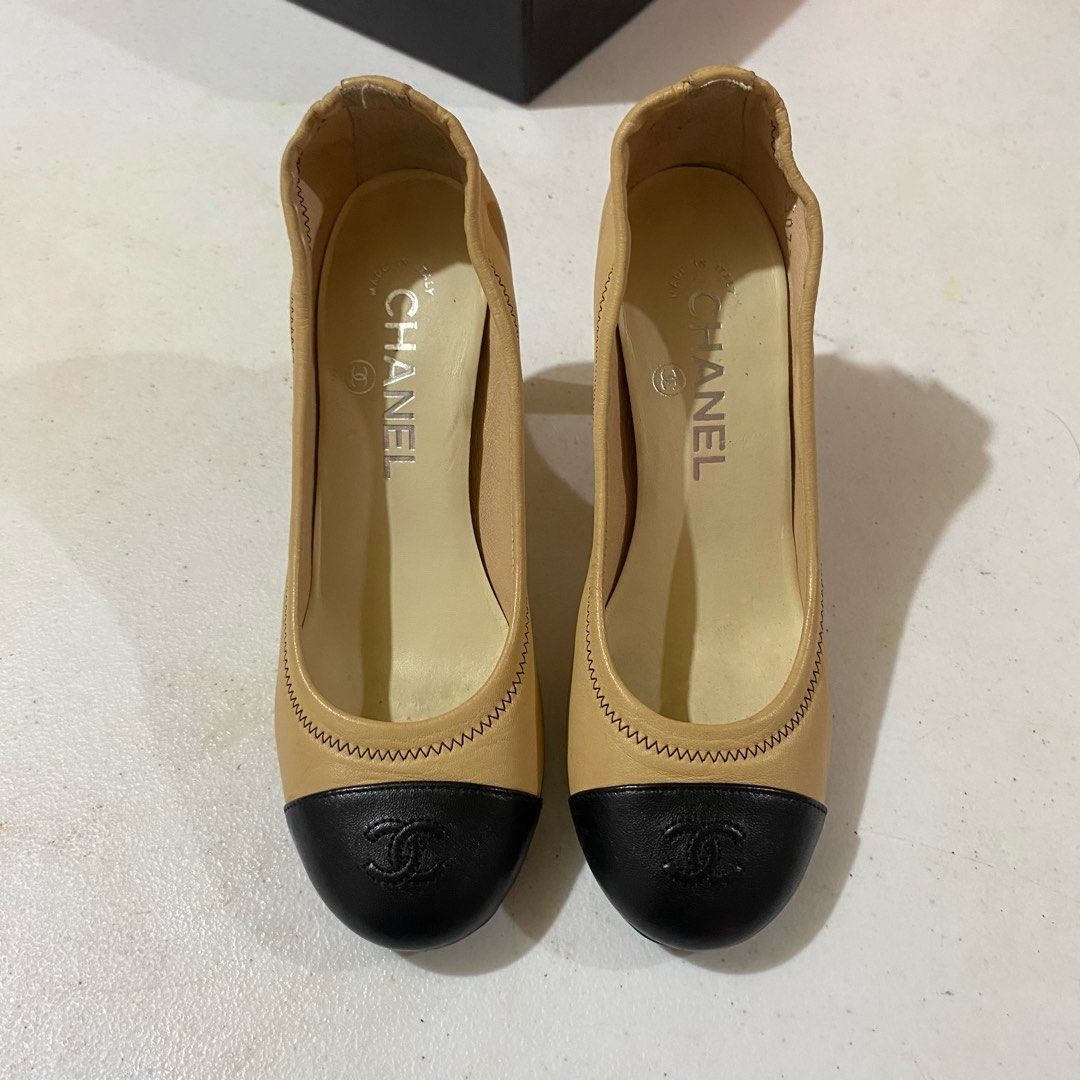 Chanel CC Captoe Lambskin Heels (Category: Heels) located in Bacacay. Submitted by curatedsbyjj (Listing ID 1467722006, Image 2). Description: 100% Authentic Chanel CC Captoe Lambskin Heels in Beige/Black, Elegant designer heels featuring soft lambskin leather and iconic CC logo. Elastic trim style for a more comfy & secured fit. Classic and versatile style. • Size: 36 1/2 C (Insole is 23-23.5 CM) • Heel Height: Approximately 3 inches. • Conditio