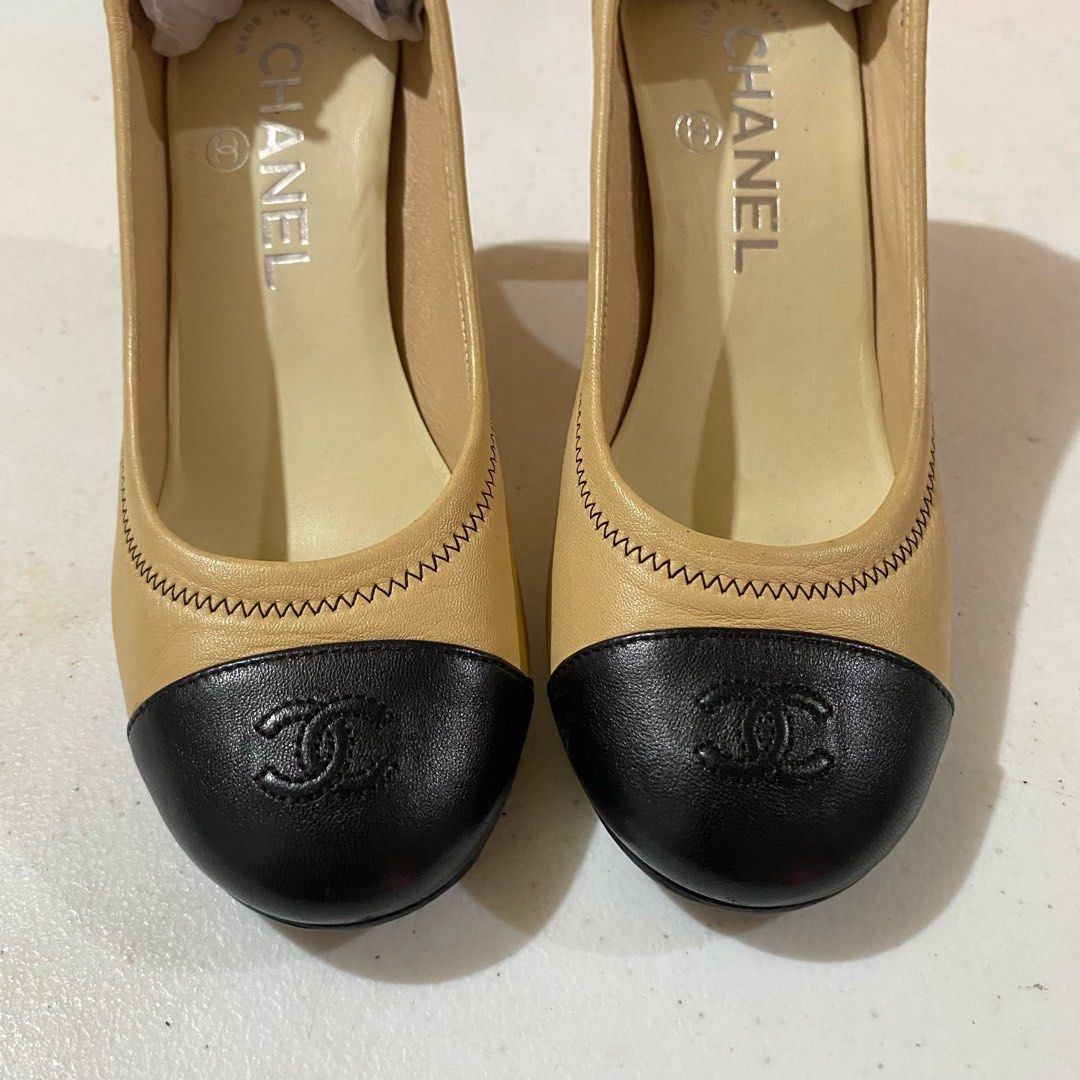 Chanel CC Captoe Lambskin Heels (Category: Heels) located in Bacacay. Submitted by curatedsbyjj (Listing ID 1467722006, Image 3). Description: 100% Authentic Chanel CC Captoe Lambskin Heels in Beige/Black, Elegant designer heels featuring soft lambskin leather and iconic CC logo. Elastic trim style for a more comfy & secured fit. Classic and versatile style. • Size: 36 1/2 C (Insole is 23-23.5 CM) • Heel Height: Approximately 3 inches. • Conditio