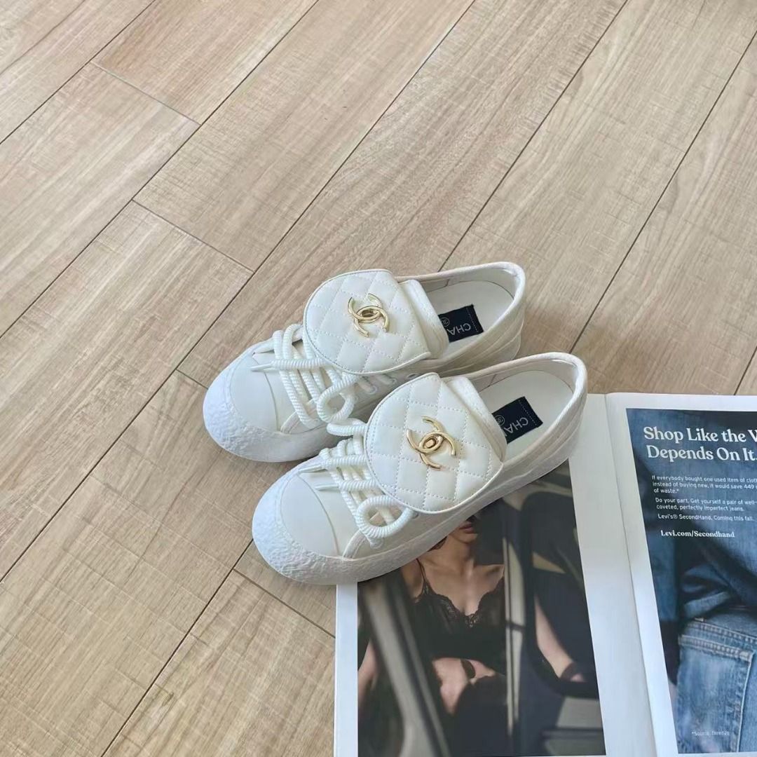 Chanel White Quilted Sneakers (Category: Sneakers) located in Manila. Submitted by brangelepo03216 (Listing ID 1467699638, Image 2). Description: - Brand: Chanel - Color: Clean White - Material: Sturdy canvas upper - Design: Quilted flap overlay on laces with gold-tone CC logo hardware - Sole: Chunky textured platform sole for an edgy look - Style: Slip-on aesthetic blended with a classic sneaker design - Fit & Feel: Comfortable for daily wear wh