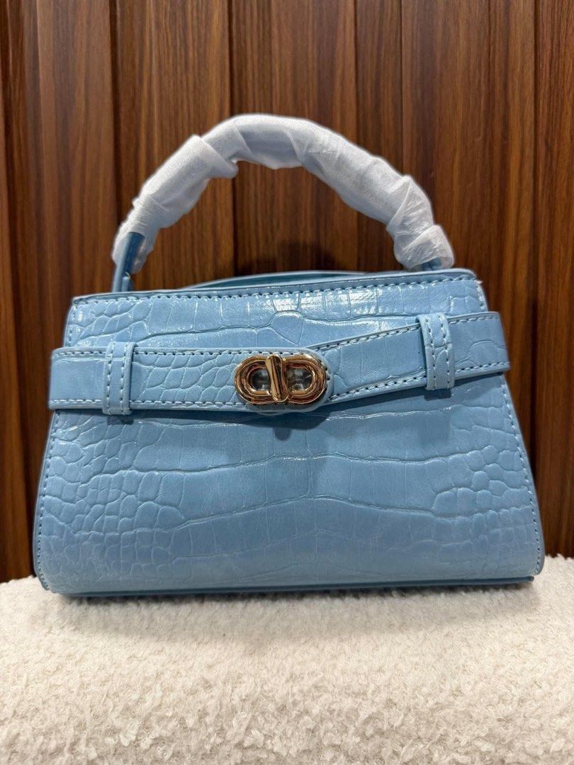 Charles & Keith Aubrielle Croc Effect Belted Top Handle Bag (Category: Shoulder Bags) located in Taguig. Submitted by renzms (Listing ID 1467624716, Image 2). Description: • with paper bag • on hand & ready to ship • actual photos | what you see is what you exactly get! • shipping nationwide via tiktok co.