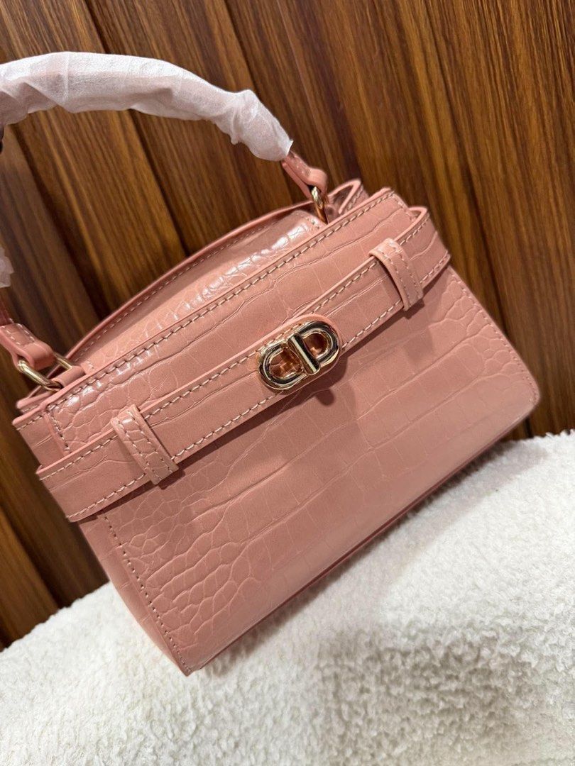 Charles & Keith Aubrielle Croc Effect Belted Top Handle Bag (Category: Shoulder Bags) located in Taguig. Submitted by renzms (Listing ID 1467643111, Image 1). Description: • with paper bag • on hand & ready to ship • actual photos | what you see is what you exactly get! • shipping nationwide via tiktok co.
