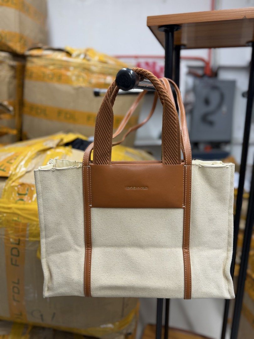 Charles & Keith Canvas and Leather Tote Bag (Category: Tote Bags) located in Makati City. Submitted by niklaurels (Listing ID 1467642575, Image 1). Description: Shalia Canvas Tote Bag Charles and Kieth .