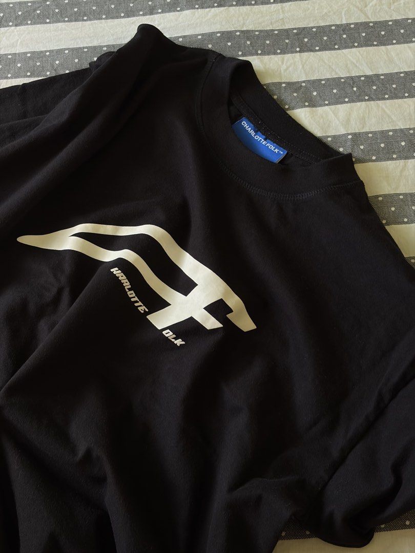 Charlotte Folk Shift Index Relaxed Tee (Category: Tshirts & Polo Shirts ) located in General Trias. Submitted by makiii10 (Listing ID 1467826743, Image 2). Description: Charlotte Folk Shift Index Relaxed Tee in Black (personal item) Cotton & Polyester Oversized and Cropped Fit Silkscreen Print Used 1 to 2 times only, washed carefully. RFS: Decluttering Original Retail Price - Php 1,290.
