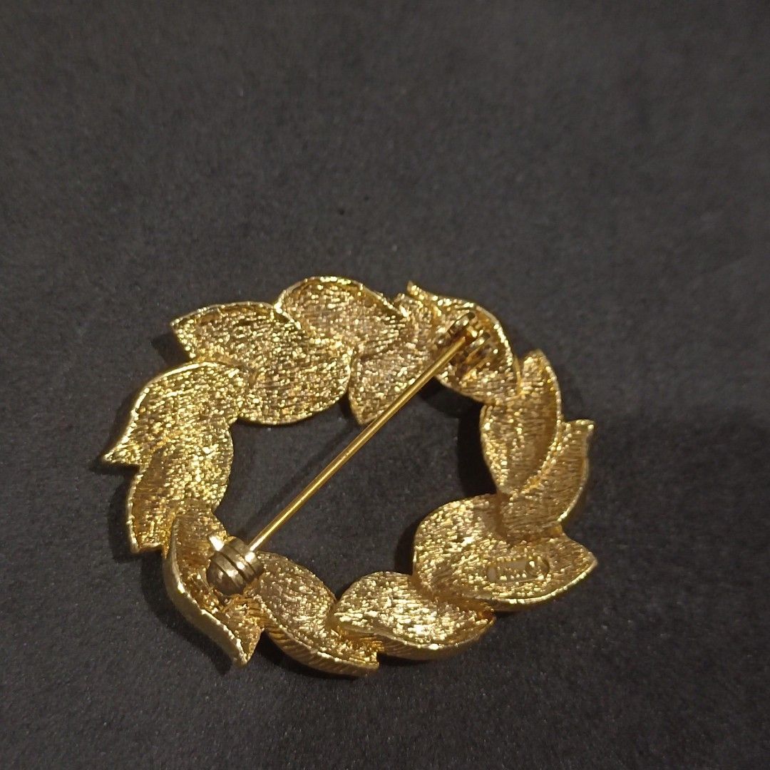 Christian Dior Leaf Wreath Brooch (Category: Brooches) located in Manila. Submitted by maxineamber (Listing ID 1467643510, Image 3). Description: Christian Dior Leaf wreath brooch pin, like new condition..