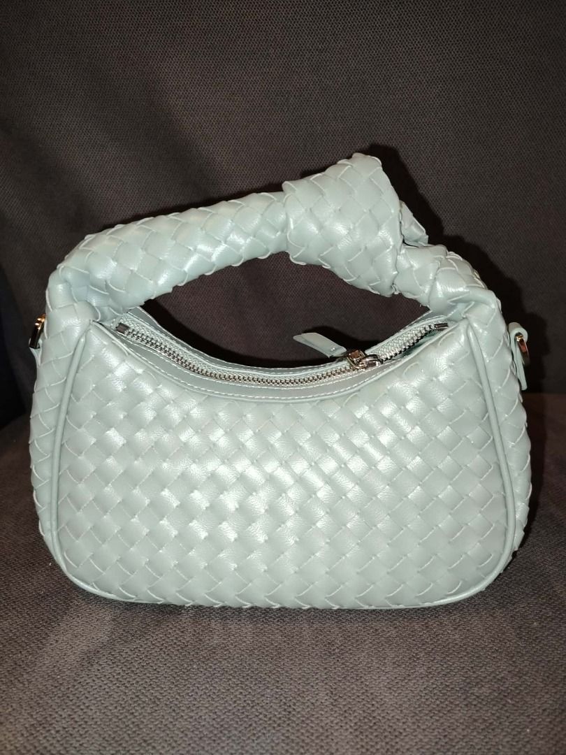 Christy Ng Woven Knot-Handle Mini Hobo Mint (Category: Luxury Bags & Wallets) located in Caloocan City. Submitted by luxesavvy63110 (Listing ID 1467770317, Image 1). Description: Brand new Christy Ng mini hobo in woven mint leather with knotted top handle and zip closure. Fits your phone, wallet and essentials. Meetup or shipping available..