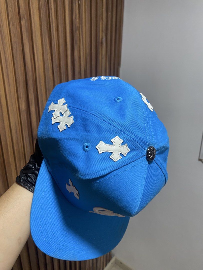 Chrome Hearts Blue Cross Patch Snapback Hat (Category: Caps & Hats) located in Caloocan City. Submitted by heatedcaps4425 (Listing ID 1467801622, Image 3). Description: - Brand: Chrome Hearts - Style: Snapback Cap - Color: Bright blue with white accents - Details: White leather cross patches all over, large Gothic CH embroidered front logo, arched "Chrome Hearts" back lettering - Hardware: Silver metallic top button - Closure: Adjustable snap str