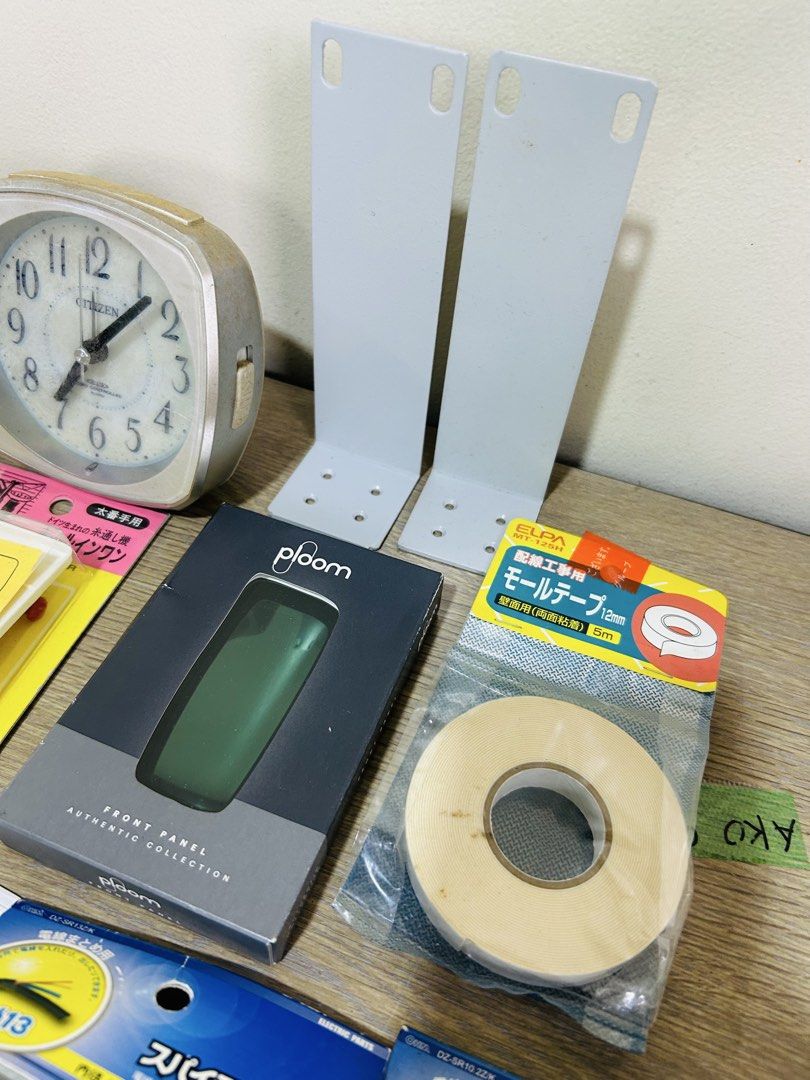 Citizen Alarm Clock and DIY Hardware Assortment (Category: Clocks) located in Manila. Submitted by starbalesukandjapansurplus (Listing ID 1467665030, Image 3). Description: - Elegant cream-housing Citizen desk clock - Complete DIY and cable management hardware bundle - Includes metal brackets and corner braces - Comes with cable holders and spiral tubes - Includes double-sided tape rolls and audio cables - Everything pictured is sold together as 