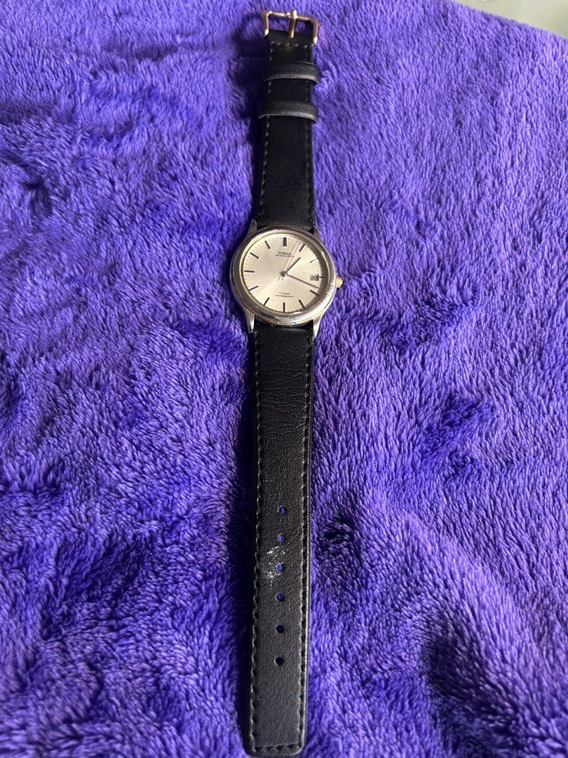 Citizen Forma Quartz Watch with Black Leather Strap (Category: Men's Watches) located in Cavite. Submitted by mamamia73 (Listing ID 1467794778, Image 1). Description: - Brand/Model: Citizen Forma Quartz Watch - Dial: Round silver with date window at 3 o'clock - Accents: Gold-tone crown and hands - Strap: Black leather with standard buckle - Condition: Clean glass and bezel, great overall appearance - Style: Classic minimalist, ideal for daily wea