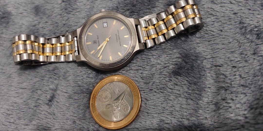 Citizen Thunder Bird (Full Titanium) (Category: Men's Watches) located in Cebu City. Submitted by aceoftime (Listing ID 1467765789, Image 3). Description: In good condition Analog quartz with date display Tjtanium case and bracelet 10bar water resist Made by Citizen Watch only Our Guarantee: 💯 Authentic All watches are checked by our experienced technician to ensure good functionality Please manage your expectations since these are preloved watc