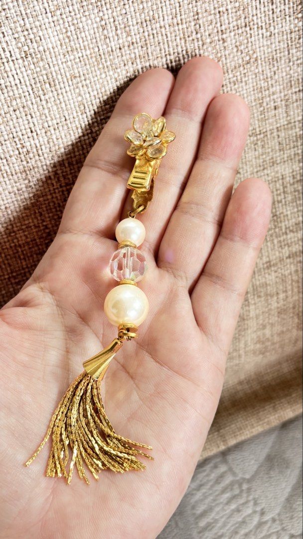 Clip charm with gold and pearl (Category: Vintage Collectibles) located in Calamba. Submitted by cur8d (Listing ID 1467608475, Image 3). Description: authenticity not guatanteed.