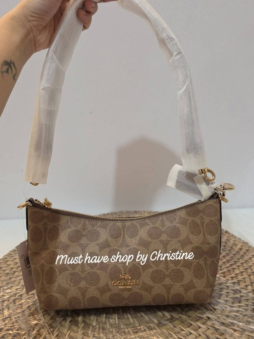 Coach Caitlin brown tan (Category: Shoulder Bags) located in Bauang. Submitted by chictine (Listing ID 1467773508, Image 1). Description: Coach Caitlin brown tan Brandnew and sealed 💯 Guaranteed original or moneyback if proven fake Source from US ❌If in doubt don't buy‼️ ✅Open for lay-away ✅ please check my page for proof of transactions Must have shop by Christine 🚚Courier: Jnt/Lbc 📍Location: Bauang, La Union Open for meet-up around la union.