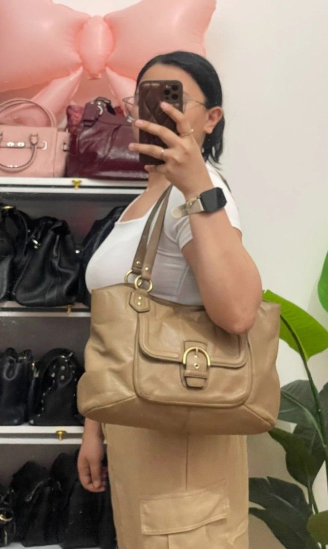 Coach Campbell Belle Carryall (Authentic/OG) (Category: Luxury Bags & Wallets) located in General Trias. Submitted by _roseandcarry (Listing ID 1467638448, Image 3). Description: Coach Campbell Belle Carryall - Caramel 🏷️ Style Code: F24961 (2013) 🔎 Authenticity: Authentic/OG 🇯🇵 sourced 👉🏻 Issues: Signs of wear, partial cracking/peeling on rubber linings, color fading, hardware tarnishing, small ink smudge on inner pocket, overall clean ins