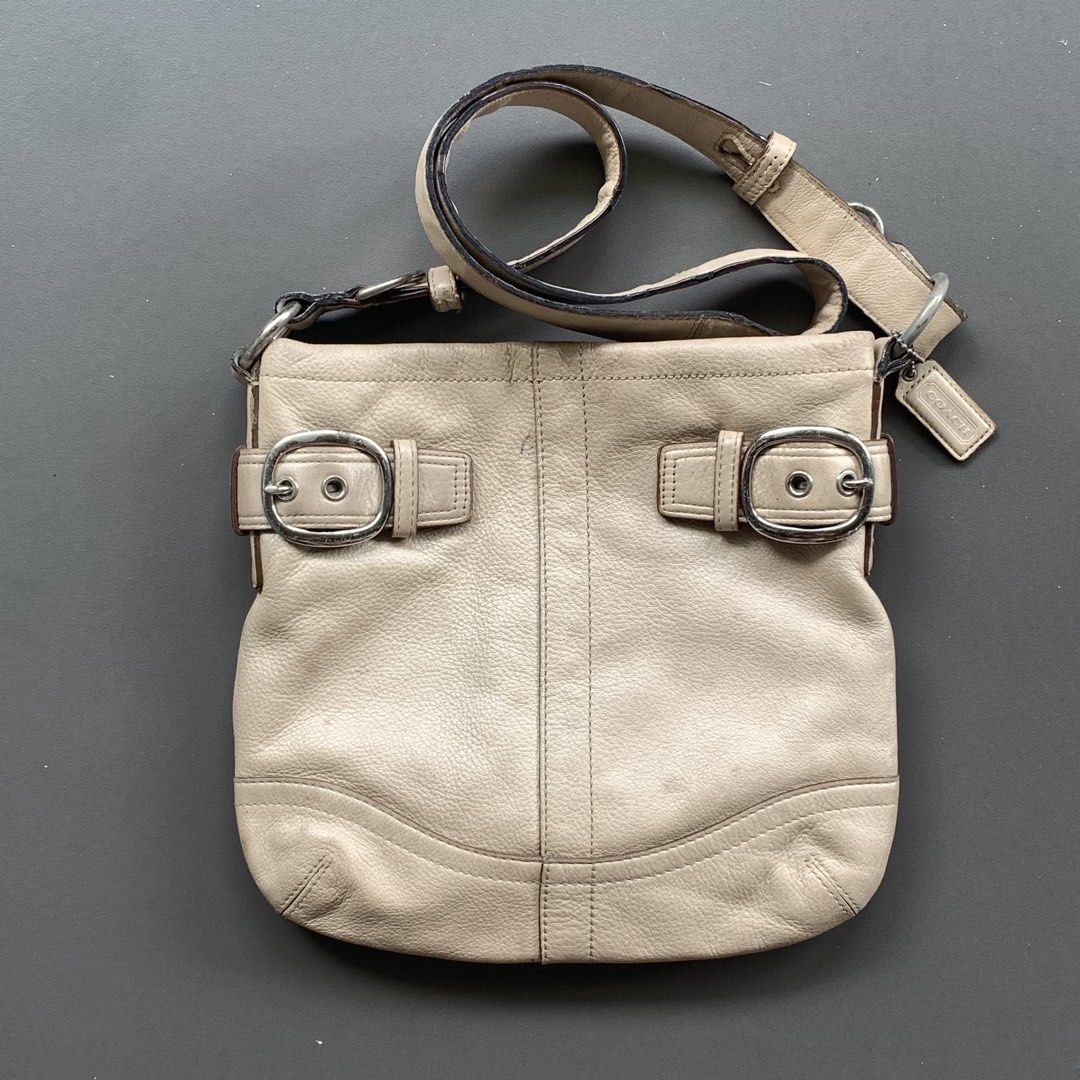 Coach Leather 2 buckle Messenger Bag (Category: Cross-body Bags) located in Cavite. Submitted by baguette_bae (Listing ID 1467651253, Image 1). Description: Sign of usage, minimal ink rubber lining.