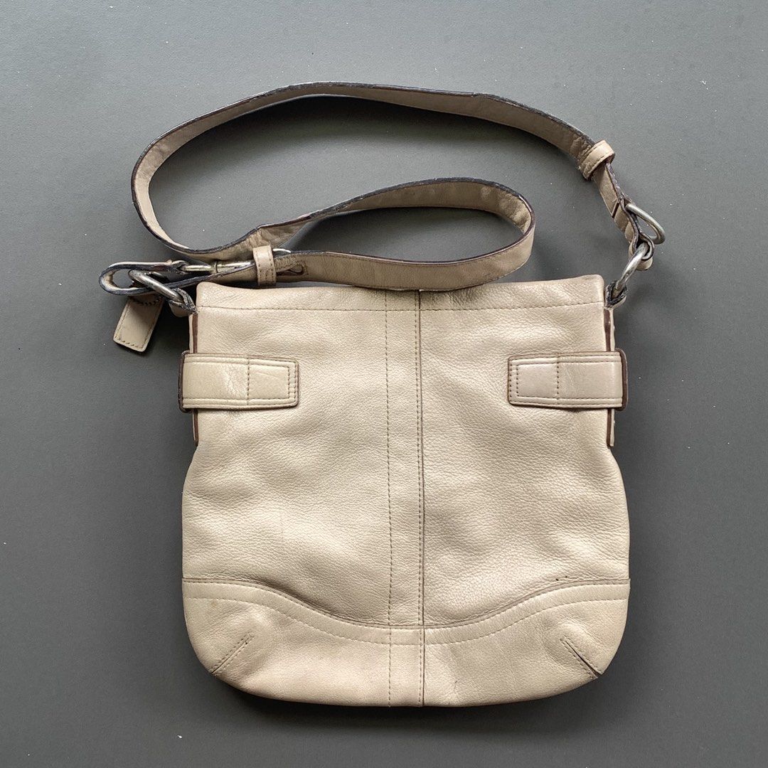Coach Leather 2 buckle Messenger Bag (Category: Cross-body Bags) located in Cavite. Submitted by baguette_bae (Listing ID 1467651253, Image 2). Description: Sign of usage, minimal ink rubber lining.