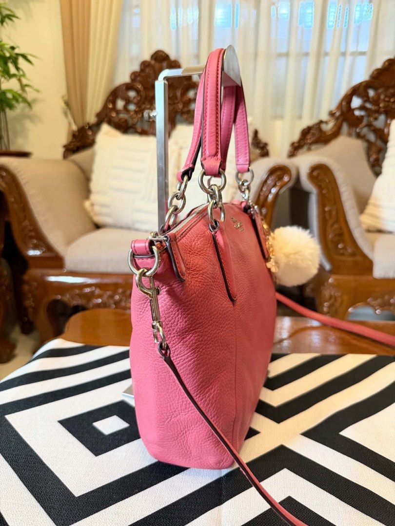 Authentic Coach Kelsey Pink Leather Shoulder Bag Satchel (Category: Shoulder Bags) located in Santiago. Submitted by yrellagnoihsaf (Listing ID 1467633704, Image 3). Description: Coach Small Kelsey Satchel in vintage pink or old rose ✅ AUTHENTIC ✅ W/ SIGNS OF USAGE MINIMAL RUBS ON BOTTOM PARTS ONLY ✅ L 13” H 9” W 2” ✅ BODY BAG OR SHOULDER BAG ❤️accessories not included Pm me for details ❣️❣️❣️.