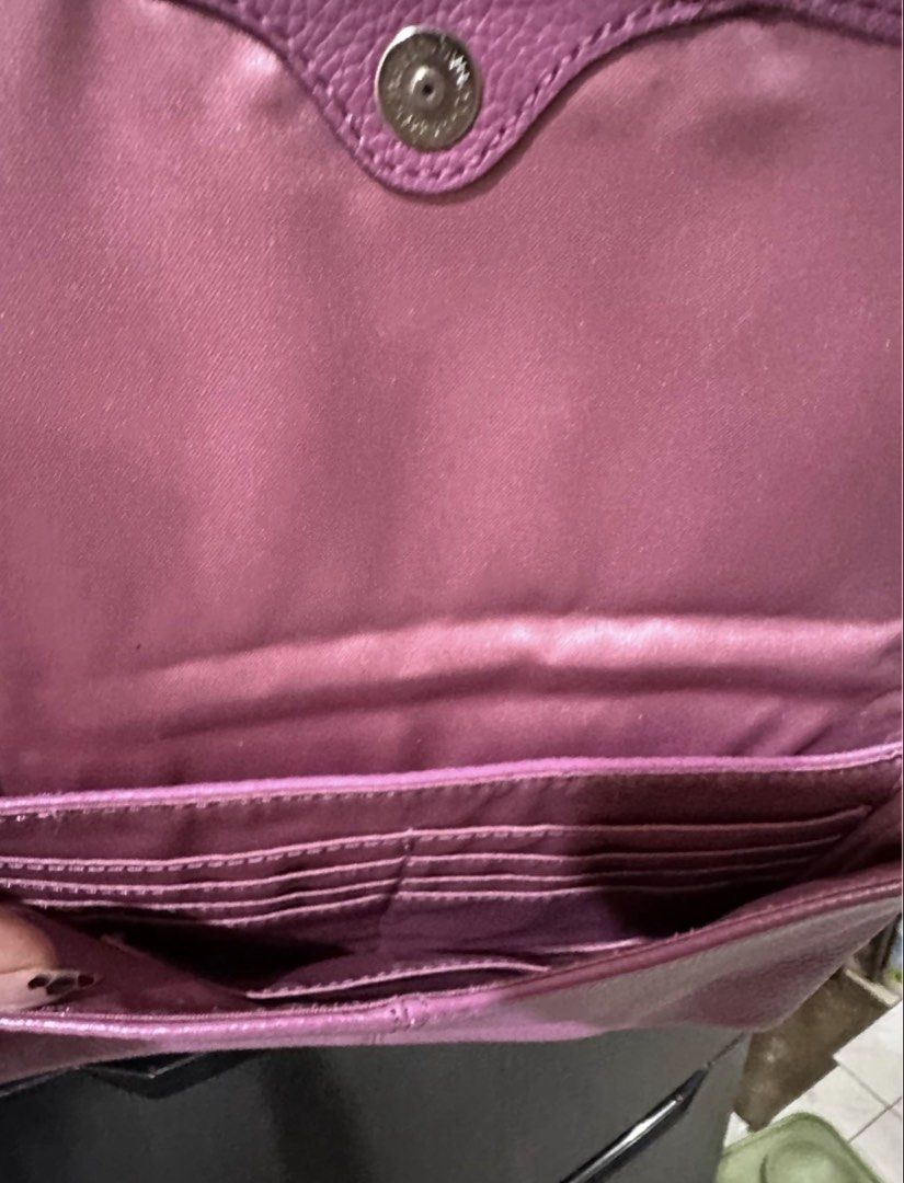 Coach Purple Leather Wristlet Wallet (Category: Wallets & Card holders) located in Cebu City. Submitted by jamaica_perez (Listing ID 1467765626, Image 3). Description: Please don’t message pag di bibili. Save us both the time. As long as di pa marked as sold, meaning AVAILABLE PA ang item. NEGOTIABLE PERO WAG BARATIN THANKS! Coach purple pebbled leather wallet with a wrist strap. Magnetic snap closure on the front flap. Interior has multiple card