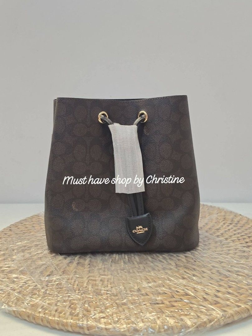 Coach rowan bucket in walnut (Category: Shoulder Bags) located in Bauang. Submitted by chictine (Listing ID 1467774292, Image 1). Description: Coach Rowan bucket in walnut Brandnew and sealed 💯 Guaranteed original or moneyback if proven fake Source from US ❌If in doubt don't buy‼️ ✅Open for lay-away ✅ please check my page for proof of transactions Must have shop by Christine 🚚Courier: Jnt/Lbc 📍Location: Bauang, La Union Open for meet-up around