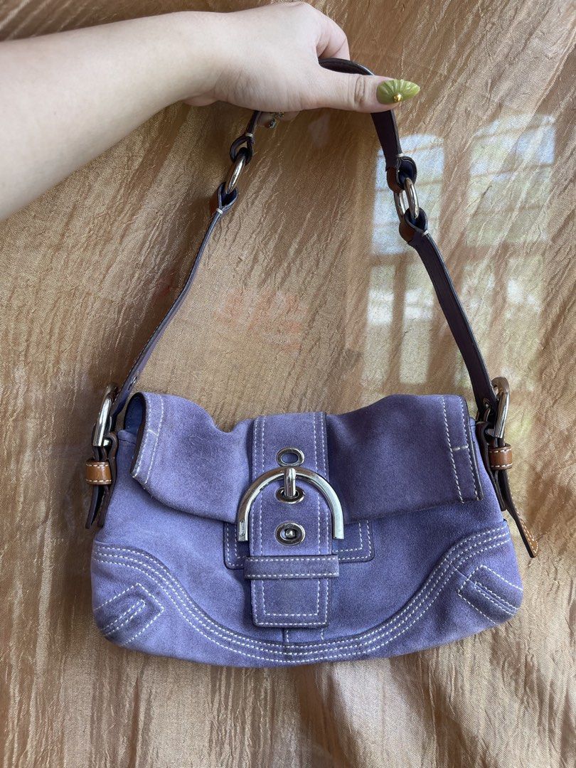 Coach Soho Suede Shoulder Bag (Category: Shoulder Bags) located in Davao. Submitted by boodle4lyf (Listing ID 1467649886, Image 1). Description: Authentic. Missing hangtag with minimal signs of use only. Strap is still intact and is reversible. Few stains on one of the compartments. .