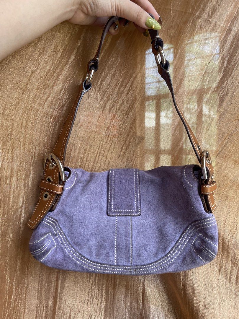 Coach Soho Suede Shoulder Bag (Category: Shoulder Bags) located in Davao. Submitted by boodle4lyf (Listing ID 1467649886, Image 2). Description: Authentic. Missing hangtag with minimal signs of use only. Strap is still intact and is reversible. Few stains on one of the compartments. .