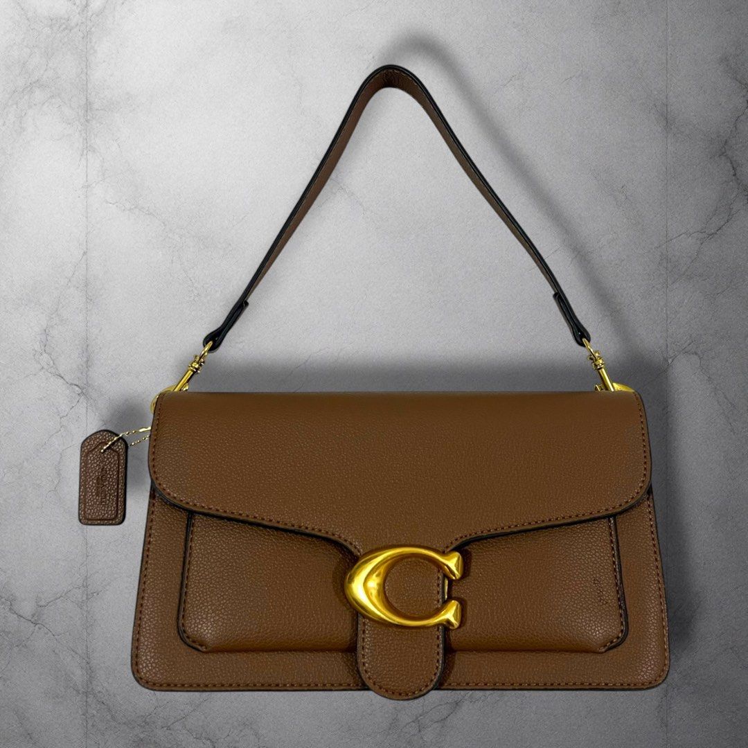 Coach Tabby Shoulder Sling Bag (Category: Luxury Bags & Wallets) located in Cavite. Submitted by itsayaaa (Listing ID 1467738987, Image 1). Description: Coach Tabby Shoulder/Sling Bag Issue: No issue Condition: Excellent Condition STARTING BID: 150 INCREMENT: 50 CLAIM: 📩.