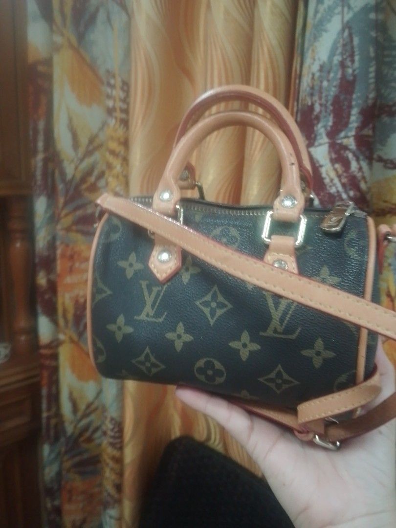 lv nano bag (Category: Shoulder Bags) located in Manila. Submitted by annemil_1984 (Listing ID 1460649249, Image 1). Description: check photo for flaw.