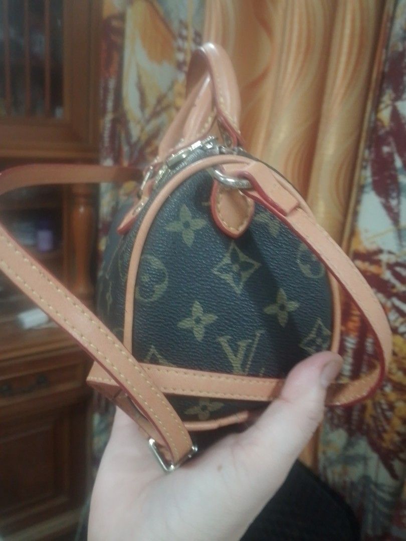 lv nano bag (Category: Shoulder Bags) located in Manila. Submitted by annemil_1984 (Listing ID 1460649249, Image 2). Description: check photo for flaw.