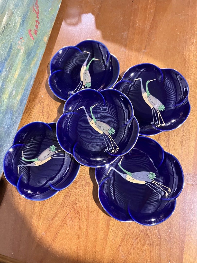 Cobalt Blue Crane Print Ceramic Flower Plates Set (Category: Dinnerware & Cutlery) located in Manila. Submitted by suarezbaby04975 (Listing ID 1467726203, Image 1). Description: - Set of 6 ceramic plates in deep cobalt blue - Hand-painted crane design with green, grey, and yellow accents - Elegant scalloped edges shaped like flower petals - Premium glossy finish - Ideal for serving small dishes, snacks, or condiments Ship at ur own risk no refund