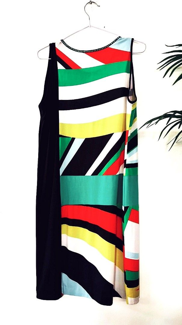 Colorful Abstract Pattern Sleeveless Dress (Category: Dresses) located in Pasig City. Submitted by ionosphere928 (Listing ID 1467681746, Image 1). Description: - Style: Sleeveless knee-length colorful dress - Design: Abstract stripes with a solid black panel colorful geometric print - Neckline: Round neck accented with design - Fabric: Lightweight, ideal for summer.