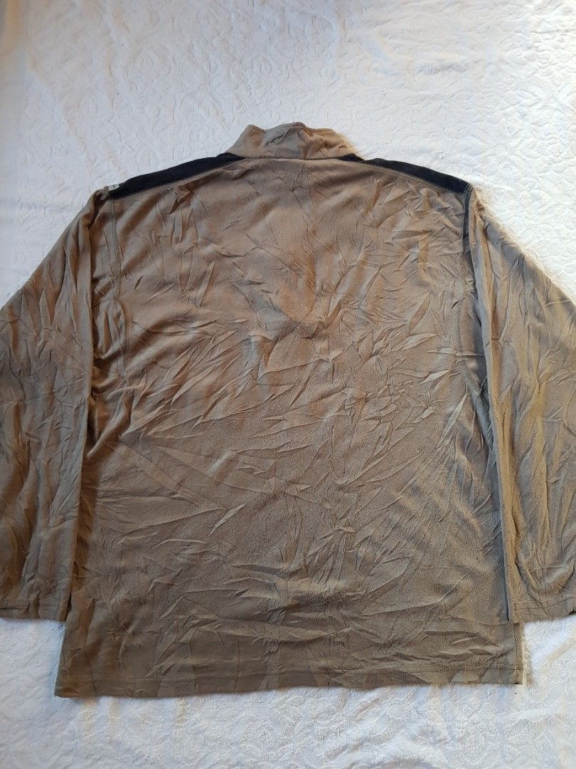 Columbia Brown Fleece Half Zip Jacket (Category: Coats, Jackets and Outerwear) located in Santo Domingo. Submitted by jcobedoza213916 (Listing ID 1467663744, Image 2). Description: Columbia Brown Fleece Half Zip Jacket Men's & Women's width 24 lenght 30 size on tag XL excellent condition color rate 9.7/10 no issue: no pinhole no flaws no discoloration.
