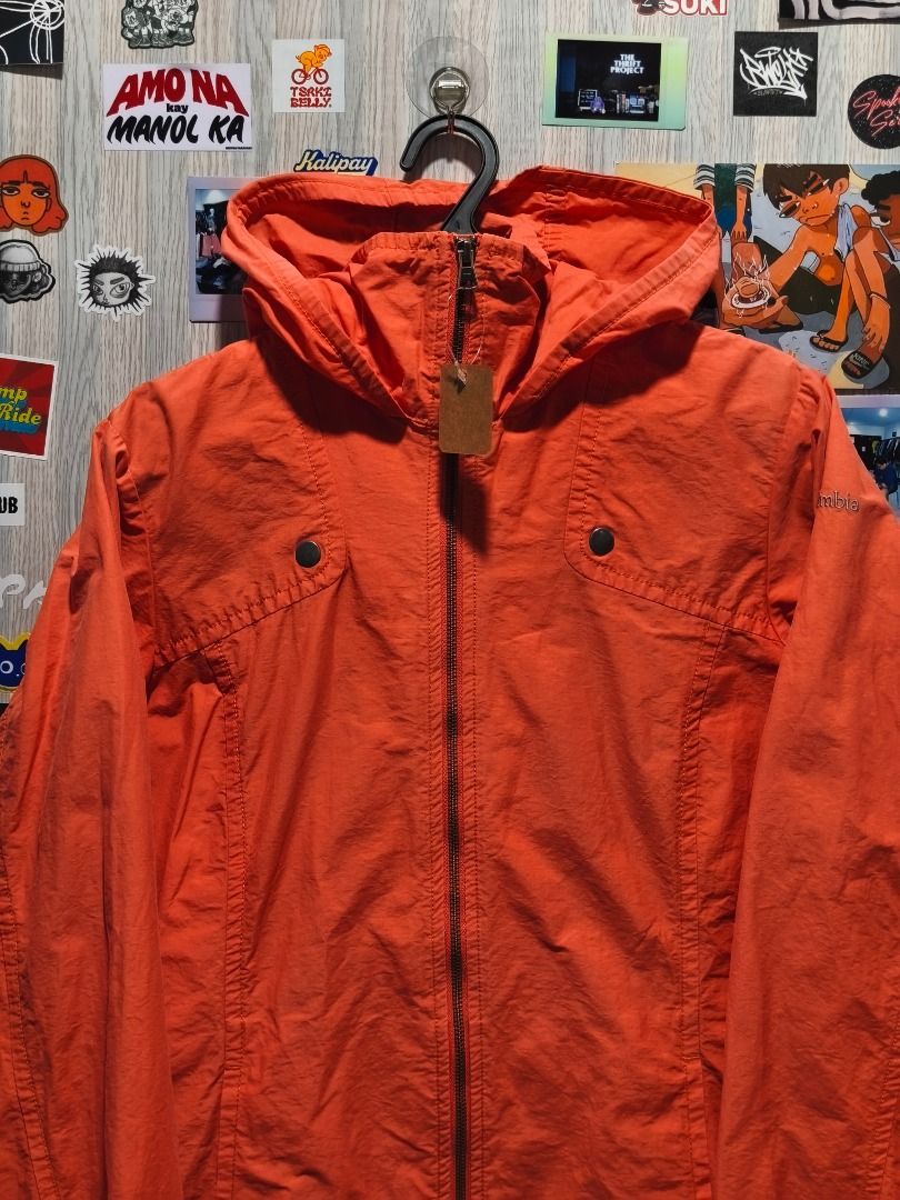 Columbia Orange Hooded Windbreaker Jacket (Category: Coats, Jackets and Outerwear) located in Davao. Submitted by thethriftproject082 (Listing ID 1467794346, Image 2). Description: Columbia 📍𝐌𝐈𝐍𝐄: 400 📍𝐒𝐈𝐙𝐄 𝐎𝐍 𝐓𝐀𝐆: M 📍𝐃𝐈𝐌𝐄𝐒: 20 x 26.