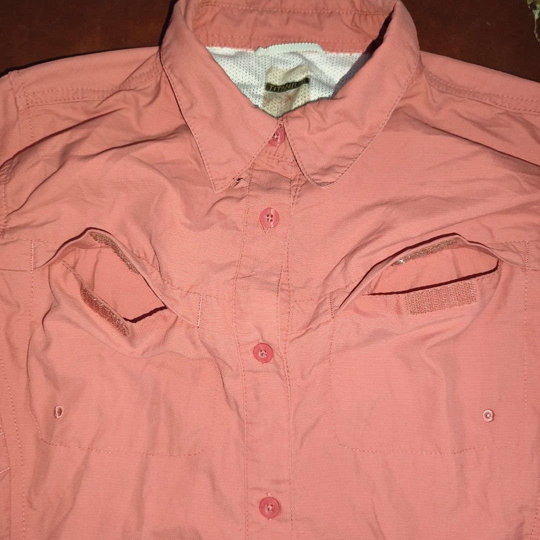 Columbia Titanium Pink Long Sleeve (Category: Activewear) located in Antipolo. Submitted by alphaomega_fox (Listing ID 1467712788, Image 3). Description: Columbia Titanium long sleeve shirt in pink. Button-up front with dual chest utility pockets and velcro closures. Extra pocket on the left sleeve. Lightweight fabric with mesh ventilation panels on the back shoulders for outdoor activities or hiking. Regular fit, button cuffs. large on tag 19x26