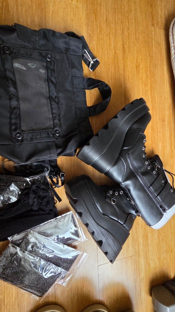 Concert Set (Boots, Bag, Socks) (Category: Boots) located in Mandaluyong City. Submitted by loijiminigo (Listing ID 1467649275, Image 1). Description: Bag, Boots, and long fishnet used once during HOTS Manila - Chunky platform boots with side zippers and buckle straps Size 7 - Black nylon shoulder bag featuring a front clear pocket window and light stick holder - Crew socks with cute ribbon ties - Three pairs of brand new, sealed sparkly metallic