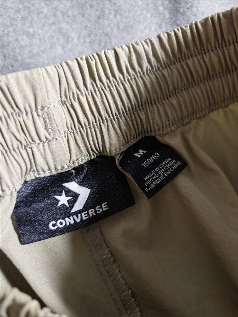 Converse Khaki Cargo Shorts (Category: Babies & Kids Fashion) located in Manila. Submitted by goku_doggo (Listing ID 1467753898, Image 2). Description: - Brand: Converse - Color: Khaki green with contrast beige cargo pockets - Size: M - Material: lightweight and stretchy - Style: Great streetwear piece for daily wear Get 2 other shorts in other listing for 250 no flaws Loc. Baguio City Open for shipping.