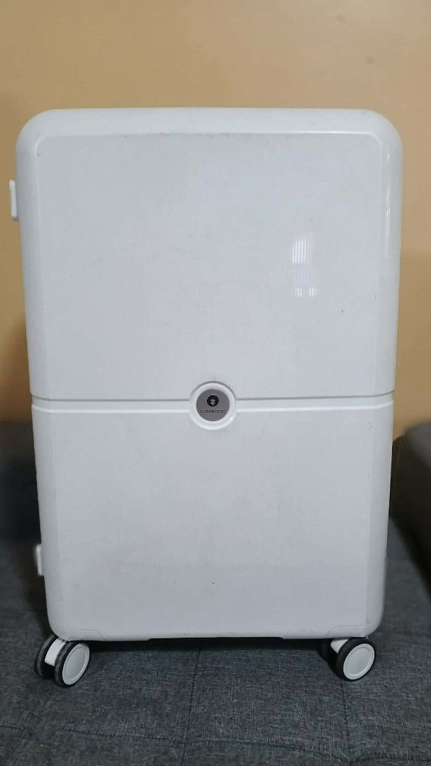 Conwood White Spinner Luggage (Category: Luggage) located in Quezon City. Submitted by mavi14 (Listing ID 1467724825, Image 1). Description: - Brand: Conwood - Color: White - Type: Hardside suitcase - Wheels: Smooth double spinner wheels - Security: Built-in side TSA combination lock - Handles: Convenient top and side grab handles - Condition: Outer shell has normal surface scuffs and zippers show some dirt from travel - Interior: Spacious capaci