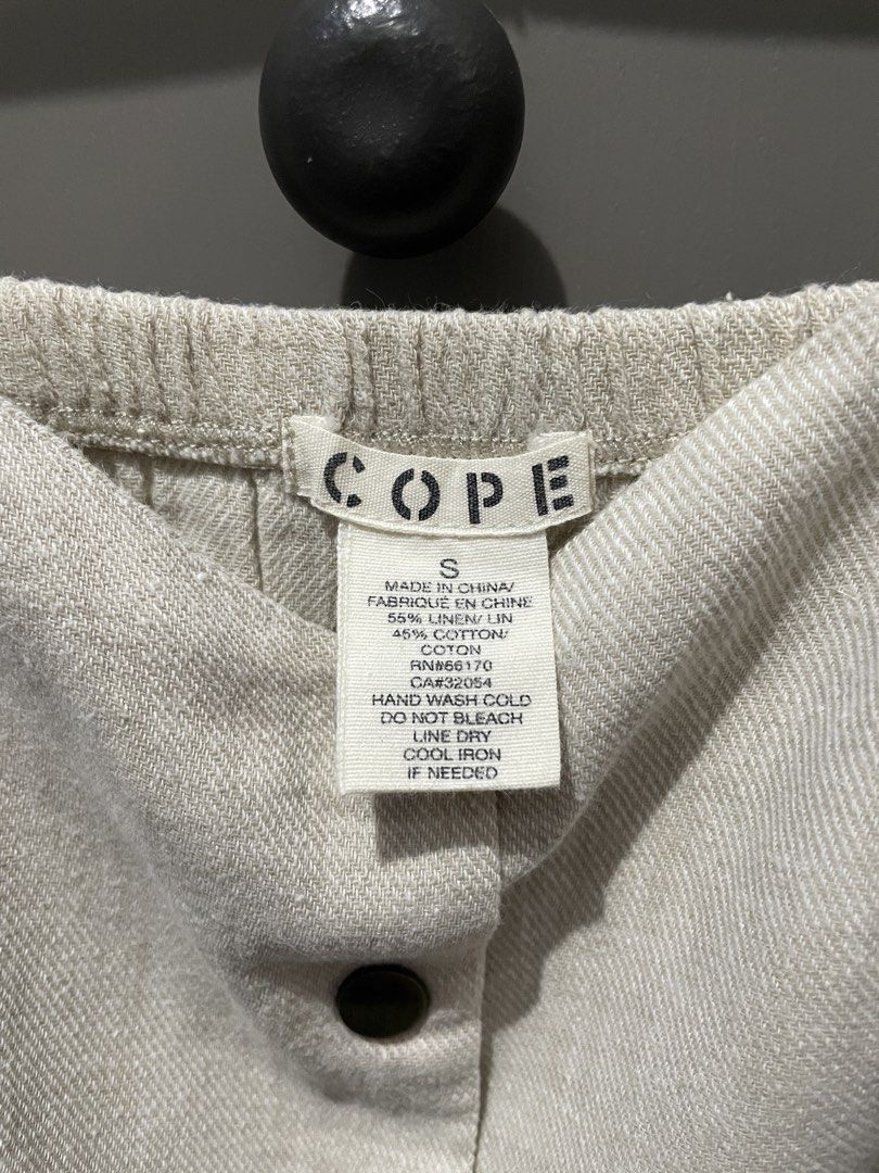 COPE Beige button-front cami midi dress and has front patch pockets. (Category: Dresses) located in Taguig. Submitted by lykamangubat (Listing ID 1467706833, Image 3). Description: .