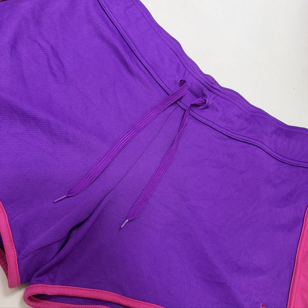 DANSKIN Sport Shorts [XL] (Category: Activewear) located in Malabon City. Submitted by k_intimates (Listing ID 1467807436, Image 2). Description: Details: • Size XL (35-38”) • Like New • Danskin purple sport shorts with pink trim and a drawstring waistband.