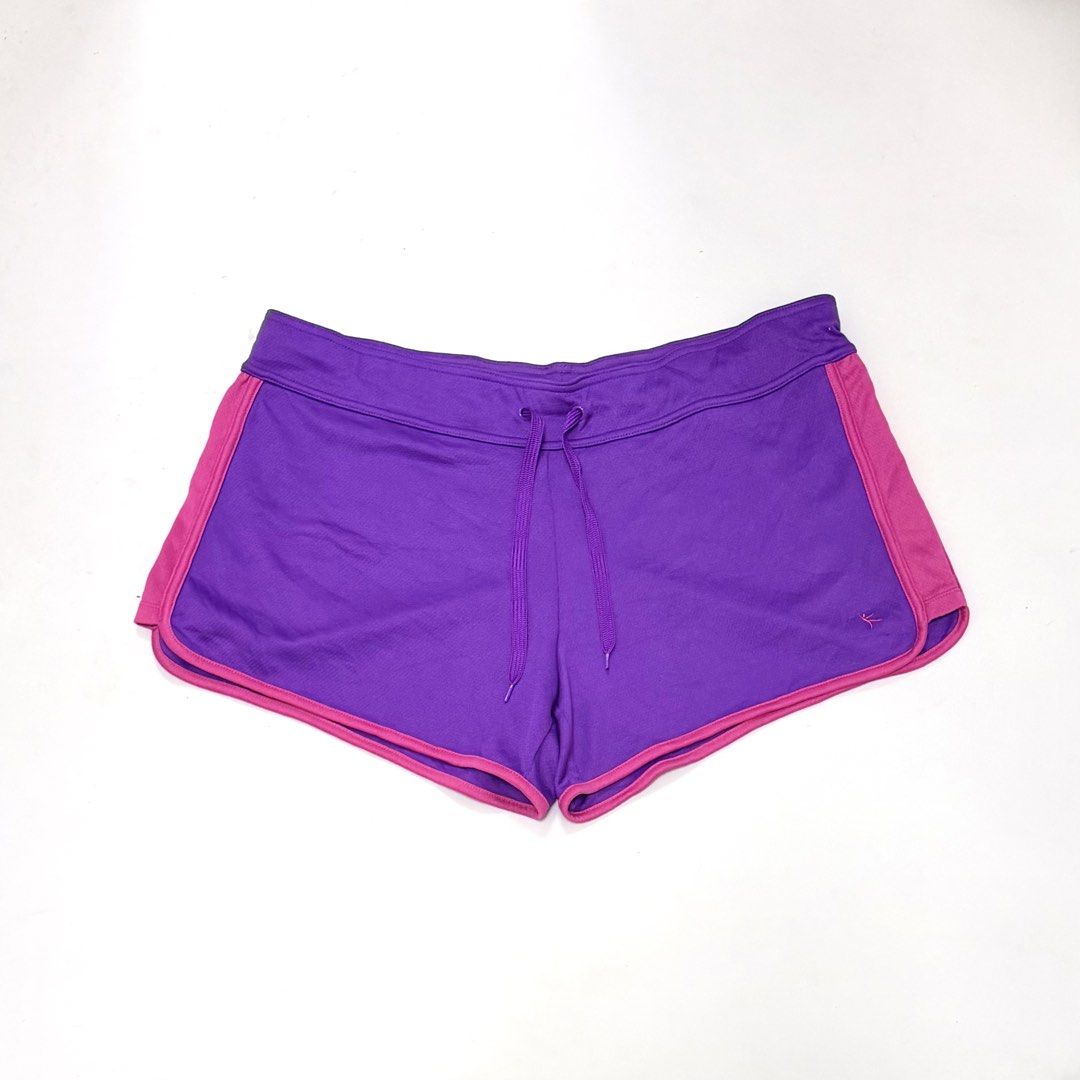 DANSKIN Sport Shorts [XL] (Category: Activewear) located in Malabon City. Submitted by k_intimates (Listing ID 1467807436, Image 1). Description: Details: • Size XL (35-38”) • Like New • Danskin purple sport shorts with pink trim and a drawstring waistband.