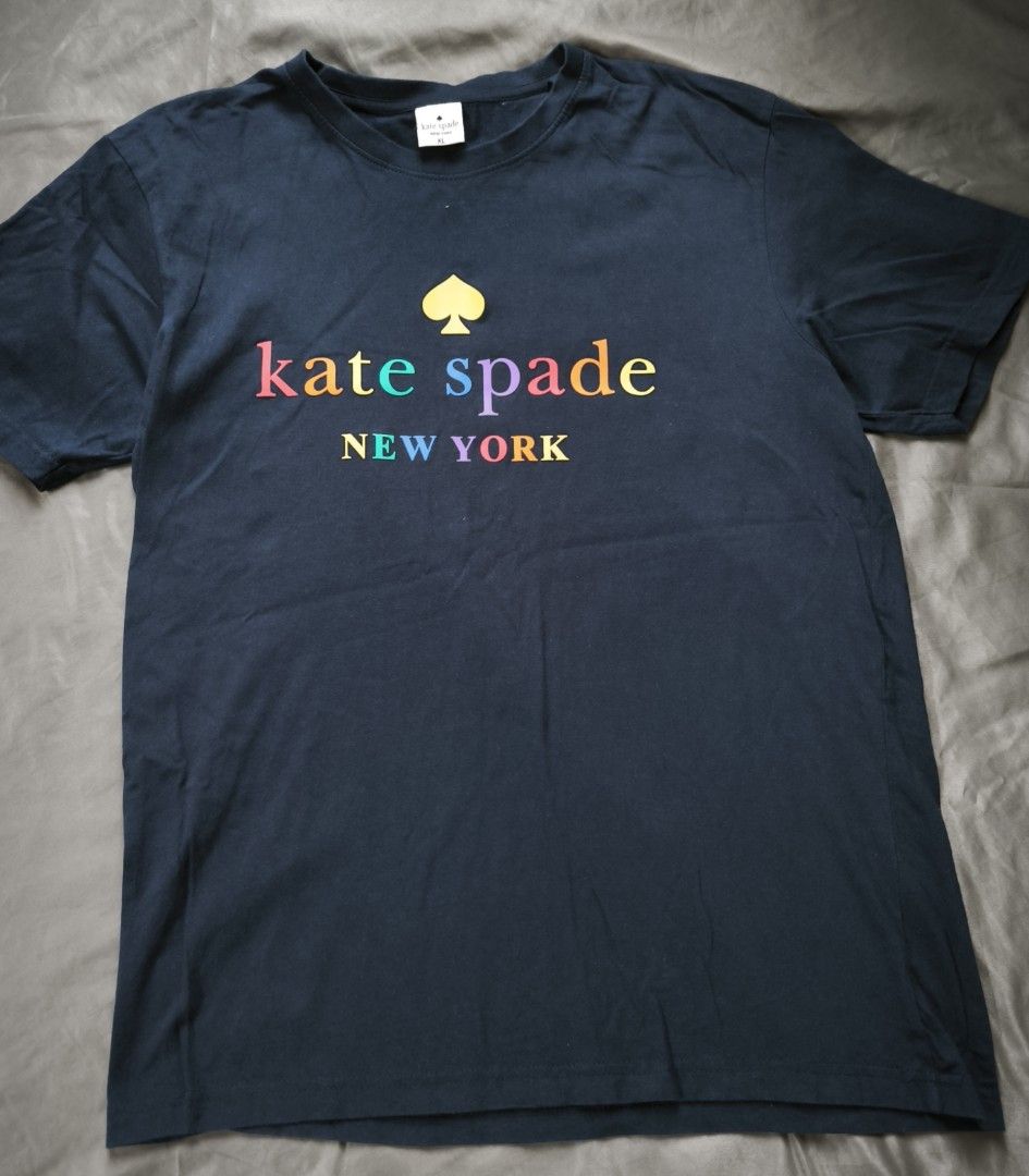 Dark blue shirt (Kate Spade 🌈) (Category: Tshirts & Polo Shirts ) located in Manila. Submitted by wearforce (Listing ID 1467770577, Image 2). Description: Dark blue shirt (Kate Spade 🌈) fit: L-XL good condition color rate 10/10 649 + sf.