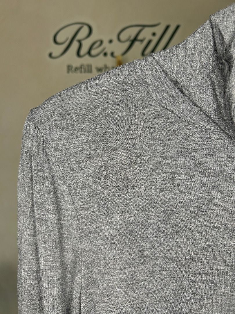 Dark Grey Turtleneck Long Sleeve Top (Category: Longsleeves) located in Taguig. Submitted by re.wear.mnl (Listing ID 1467704321, Image 3). Description: - Color: Dark grey - Style: Long sleeve with turtleneck - Size: S, 24.5 x 16.5 inches - Material: 95% Viscose, 5% Spandex (Soft & stretchy) - Condition: Great everyday basic piece.