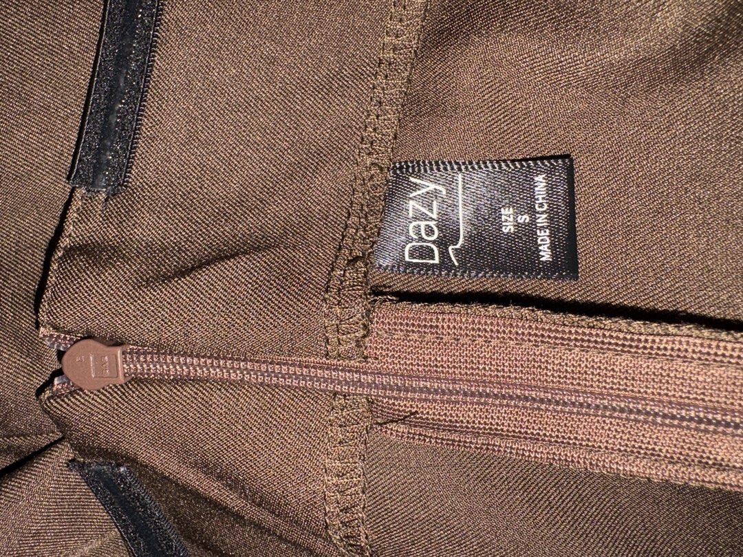 Dazy Brown Tube Top Size S (Category: Sleeveless) located in Quezon City. Submitted by everything99_ (Listing ID 1467764154, Image 2). Description: - Brand: Dazy - Size: S - Color: Brown - Style: Strapless tube top with back zipper closure - Condition: Clean fabric - Versatile basic piece, great for layering or on its own.