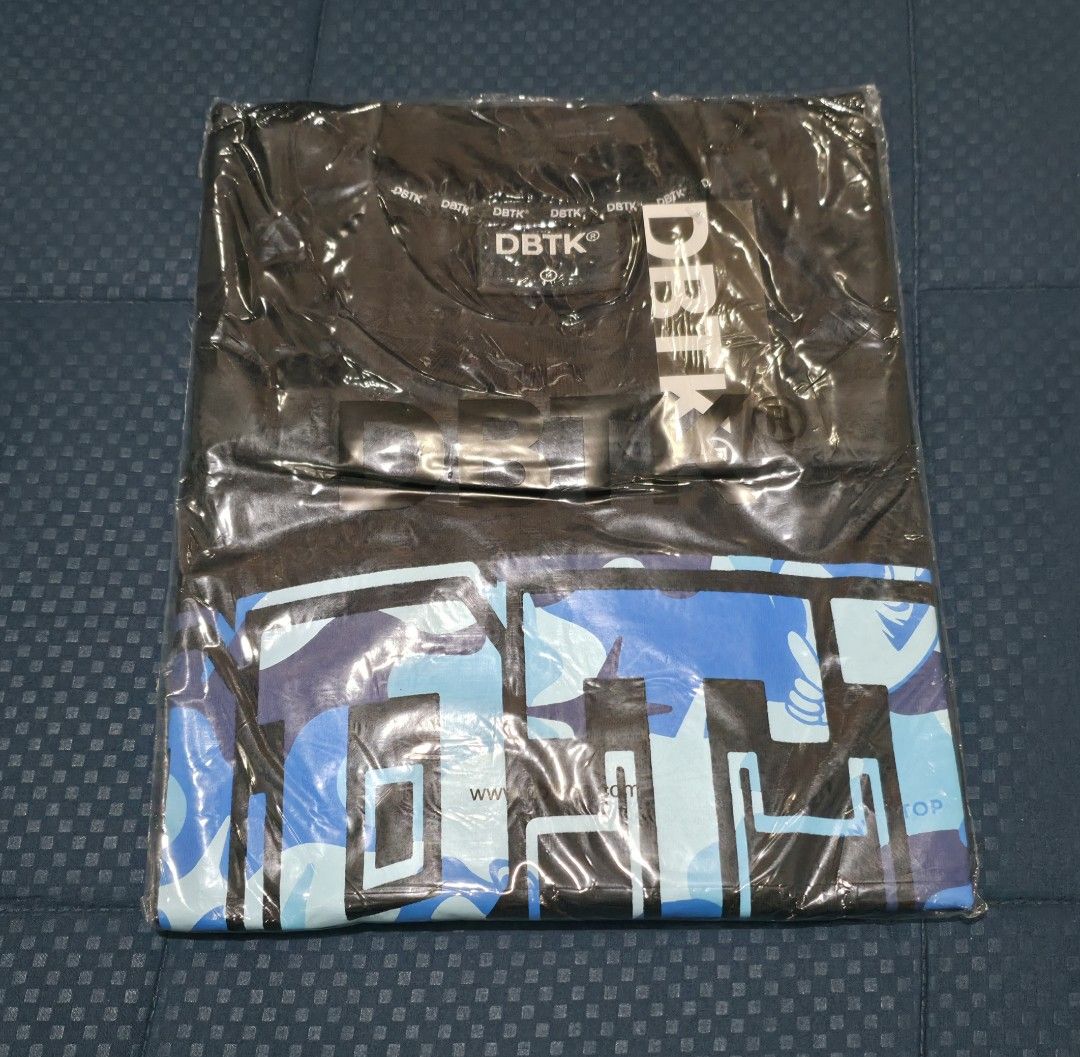 DBTK Shirt M os 23x28 (Category: Tshirts & Polo Shirts ) located in Santa Rosa. Submitted by rowhell09 (Listing ID 1467772235, Image 2). Description: DBTK Shirt Brandnew M os 23x28 💸1000 MOD. LBC MOP. BDO, GCASH LOC. NUEVA ECIJA Meet up. Santa rosa Nueva Ecija - Condition: Brand new in original plastic packaging - Color: Black with large blue camo graphic branding on chest - Fit: Heavyweight box fit, oversized style - Details: Crew neckline with