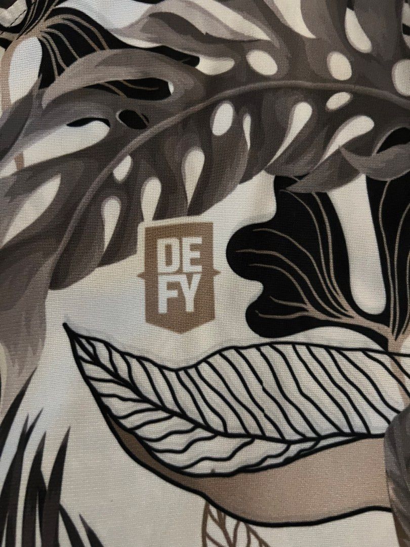 Defy Men’s Shirt (Category: Activewear) located in Quezon City. Submitted by inthefrow (Listing ID 1467676399, Image 2). Description: - Preloved - Made in the Philippines with tropical print - Dri-Fit material - For work or play • Best price already .