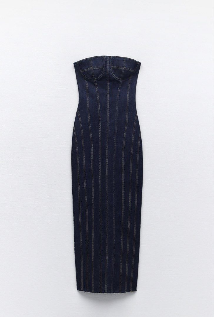 Denim Midi Dress (Category: Dresses) located in Manila. Submitted by nanabananie (Listing ID 1467649323, Image 1). Description: Selling my authentic ZARA ZW Denim Midi Dress, purchased for ₱4,395. Selling it now for ₱2,000. ✨ Very good condition, worn only 5x ✨ Classic dark-wash denim with contrast stitching ✨ Structured, strapless silhouette ✨ Selling because it no longer fits me.