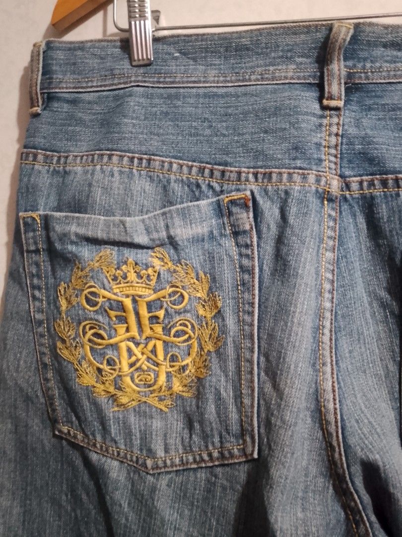 Denim shorts with embroidered back pocket logo (Category: Shorts) located in Manila. Submitted by romeoamoro00044 (Listing ID 1467740576, Image 3). Description: - Classic blue wash denim jorts - Straight leg cut, hits right around the knee - Detailed embroidery with a crown motif on the back pocket - Genuine leather patch on the back waistband - Durable double stitching throughout - Sturdy material built for everyday wear ecko unltd long jorts w 