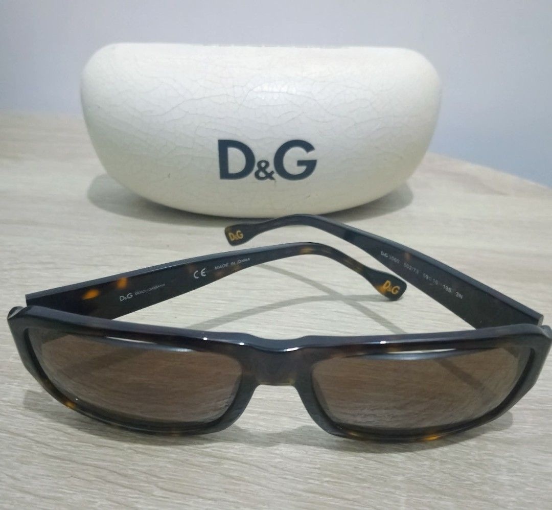 D&G authentic sunglasses, ladies preloved (Category: Sunglasses & Eyewear) located in Pateros City. Submitted by foryoufindsph (Listing ID 1467669354, Image 2). Description: ​Condition: Lightly used. Frame & lenses are sturdy and intact; minor hairline signs of use (barely noticeable). ​Best Suits: Round, Oval, and Heart face shapes ​Inclusions: Original D&G Hard Case + Soft Cloth/Pouch ​💰 Price: ₱3,500 (Slightly negotiable for fast buyers) 📦 S