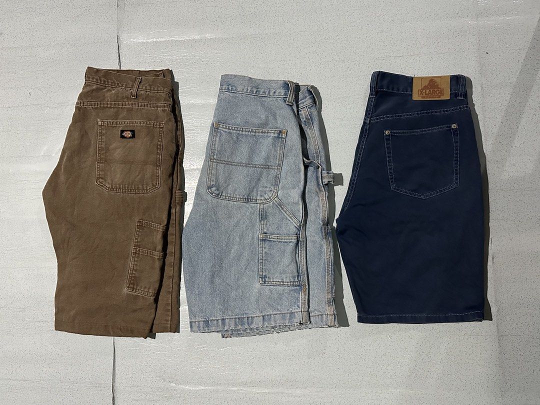 Dickies & X-Large Denim and Cargo Shorts Bundle (Category: Shorts) located in Manila. Submitted by jeproxthrift (Listing ID 1467811048, Image 2). Description: - Bundle of 3 heavy-duty shorts for daily wear or skating - Pair 1: Brown Dickies carpenter shorts with utility pockets - Pair 2: Light wash denim carpenter shorts featuring a hammer loop - Pair 3: Dark blue X-Large shorts with contrast stitching and leather brand patch - Made with durable,